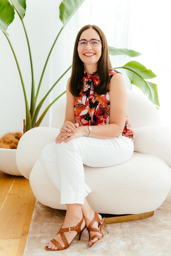 Brisbane Branding Photographer Kylie Hayes Coach sitting in white armchair