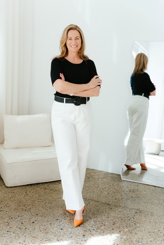 Woman standing with her arms crossed